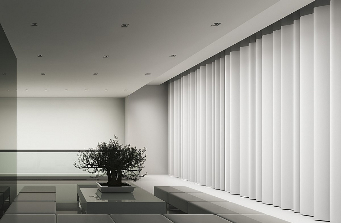 ERCO recessed ceiling lights illuminate a minimalist room with curtains and a bonsai tree.