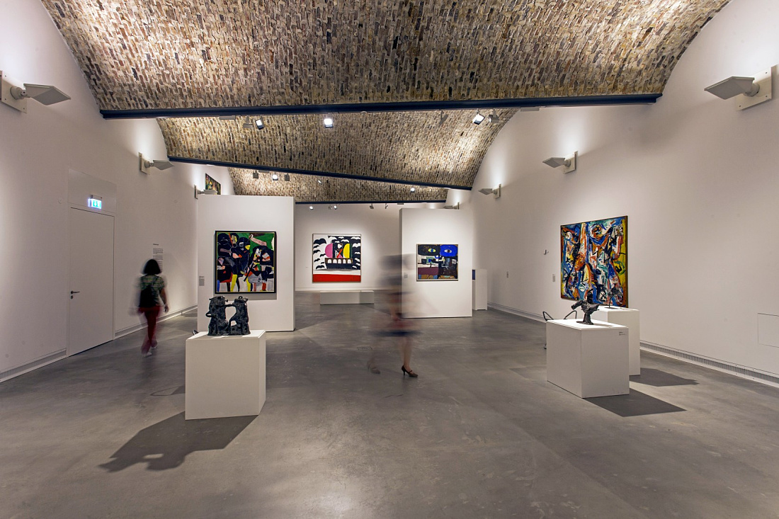 Interior of Ravensburg Art Museum featuring LED lighting and displayed artwork.