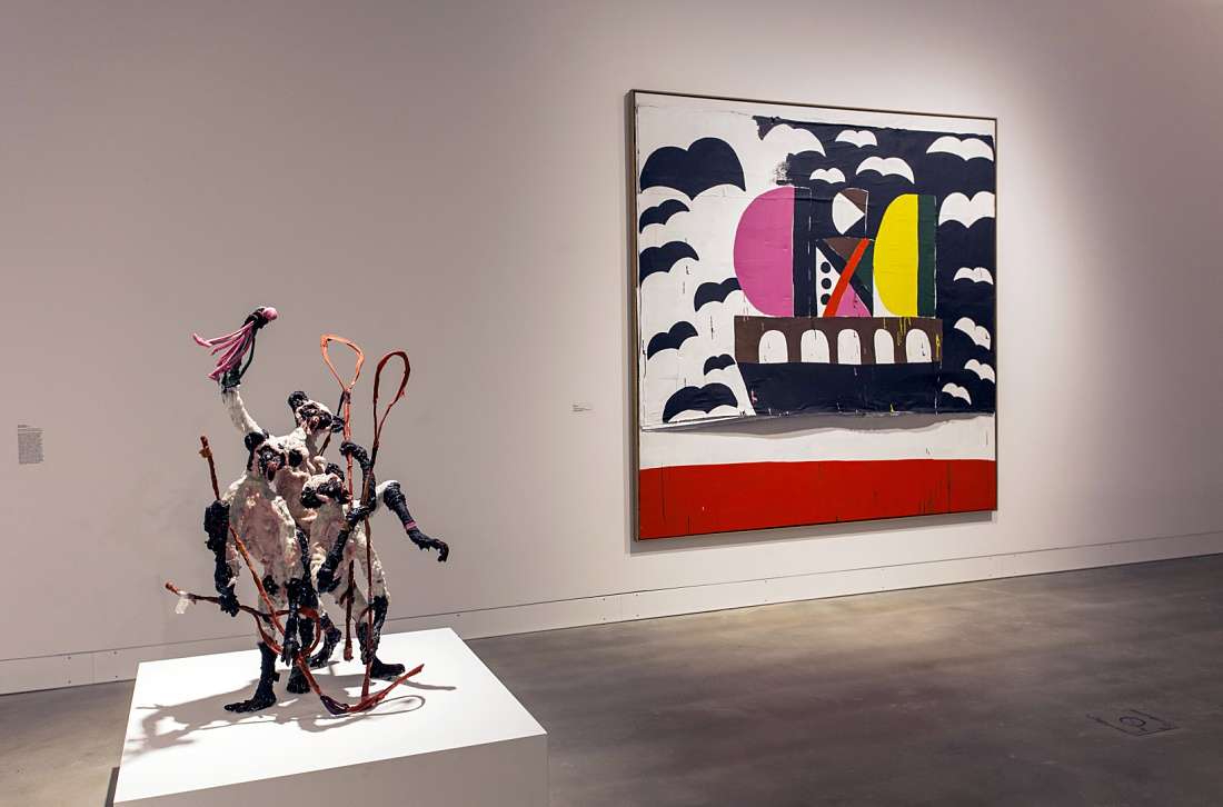 Art exhibit at Ravensburg Art Museum featuring sculpture and painting, lit by ERCO lighting.