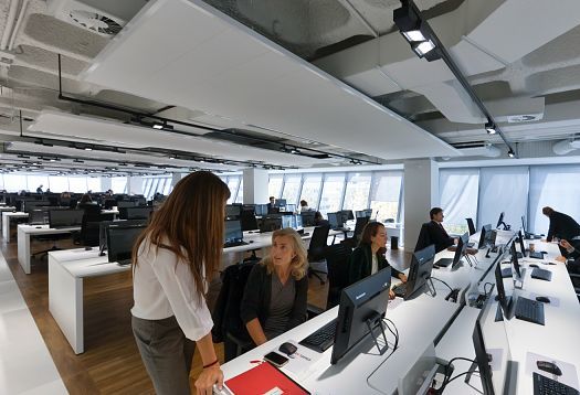 ERCO lighting at Engel & Völkers Market Center Madrid: Opton spotlights and Compact recessed luminaires for efficient office lighting.