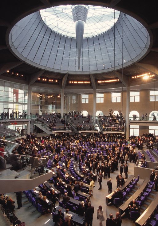 Interior view of the Reichstag Building featuring the glass dome and ERCO lighting.