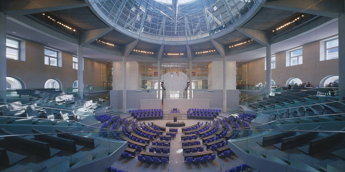 Interior view of the Reichstag Building with glass dome and ERCO lighting.