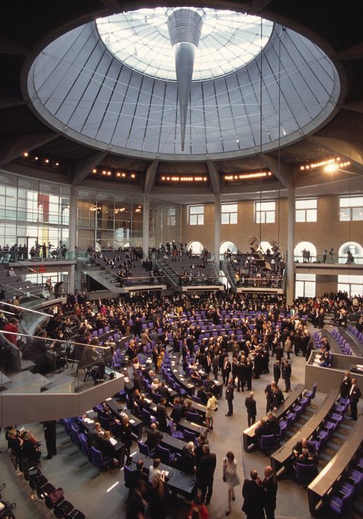 Interior view of the Reichstag Building featuring the glass dome and ERCO lighting.