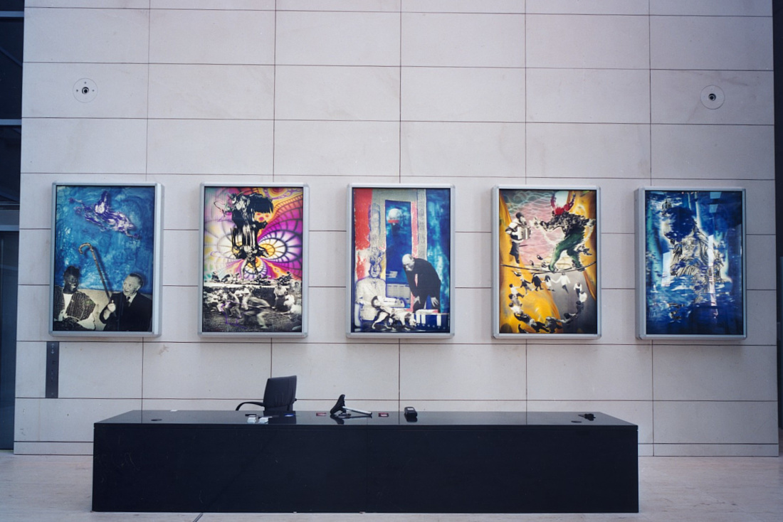 Contemporary art in the Reichstag Building, illuminated to highlight modern themes.