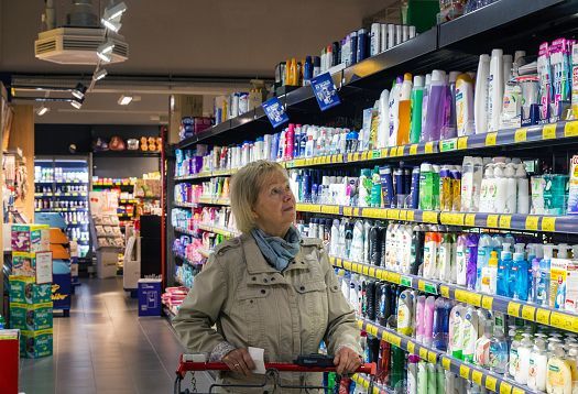 REWE supermarket in Hagen-Hohenlimburg with ERCO LED lighting accentuating products.