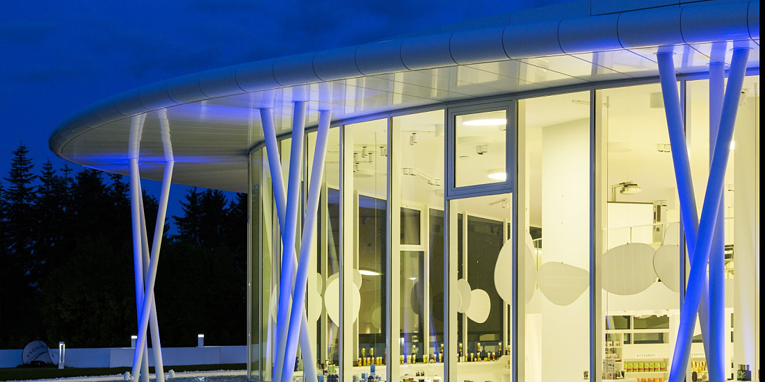 Ritzenhoff glass factory in Marsberg, illuminated with ERCO lighting solutions for showroom and conference facilities.