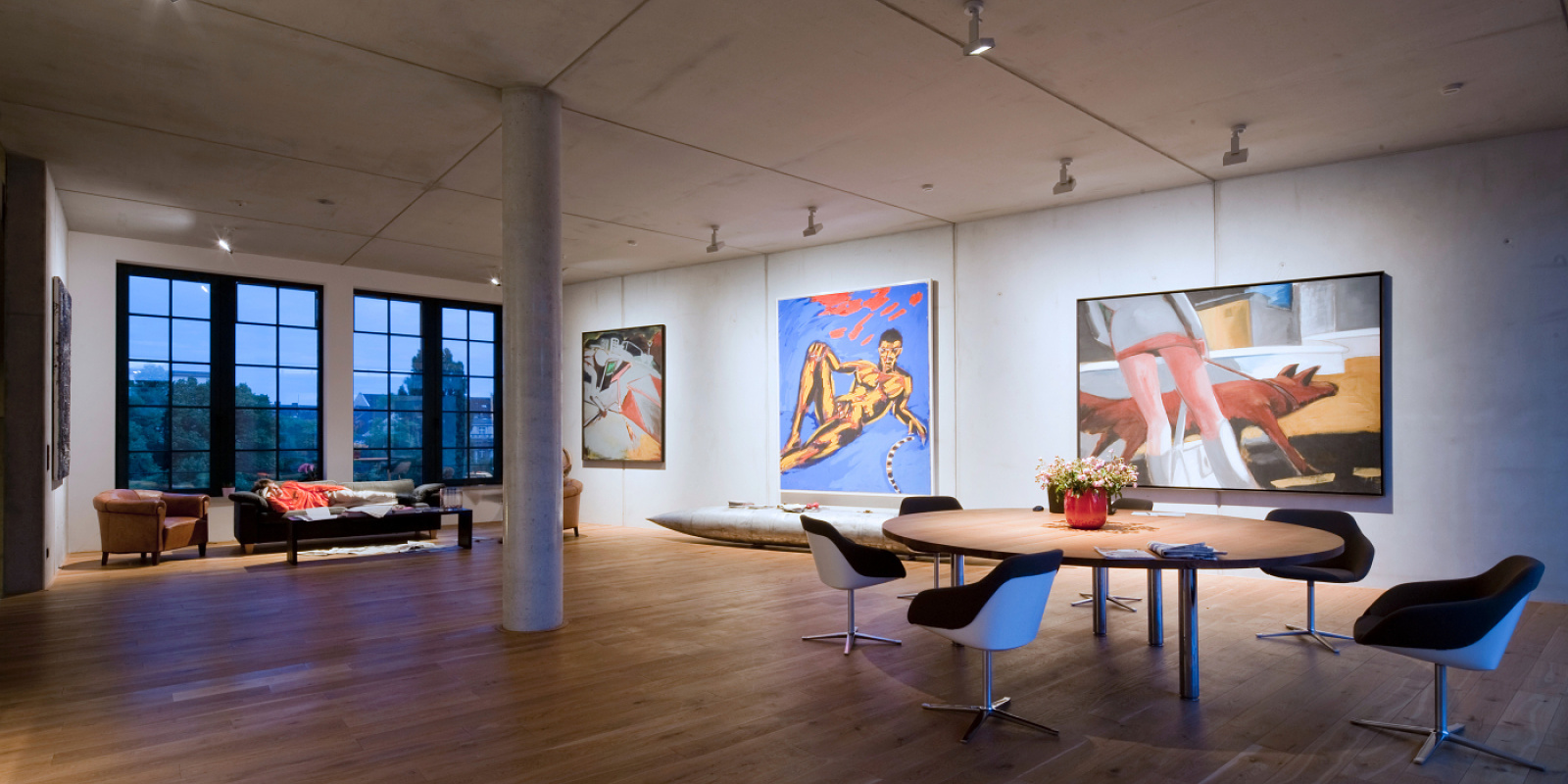 ERCO LED spotlights in a Berlin residence with art collection, accentuating the artworks.