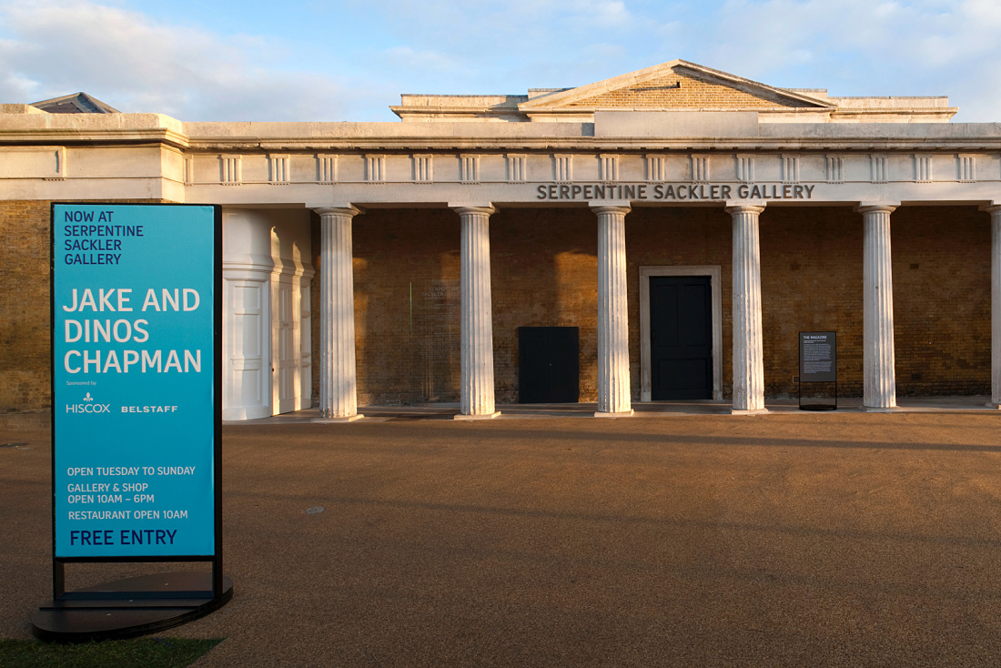 Serpentine Sackler Gallery in London, featuring the Jake and Dinos Chapman exhibition, illuminated by ERCO lighting.