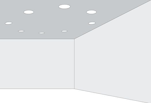 Room with recessed ceiling lights creating light patterns, illustrating laws of shape perception.