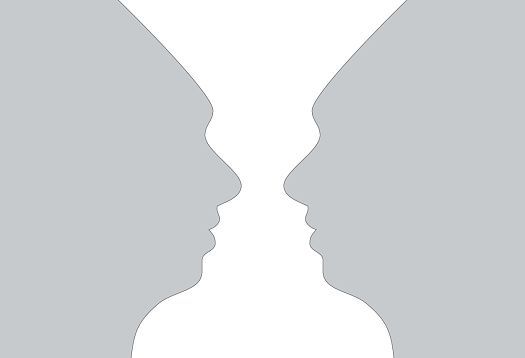 Rubin vase optical illusion, demonstrating the law of closure in shape perception.
