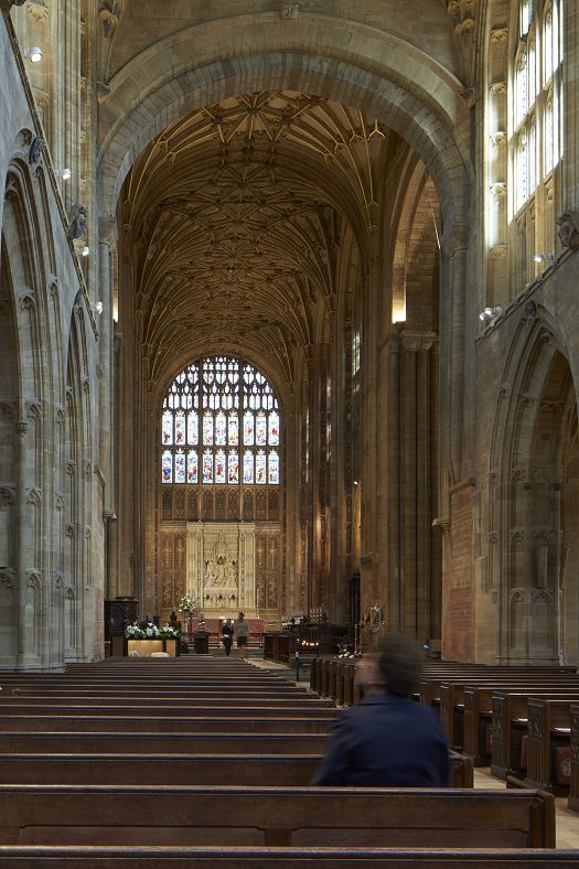 Interior of Sherborne Abbey featuring ERCO LED lighting enhancing the vaulted ceiling.