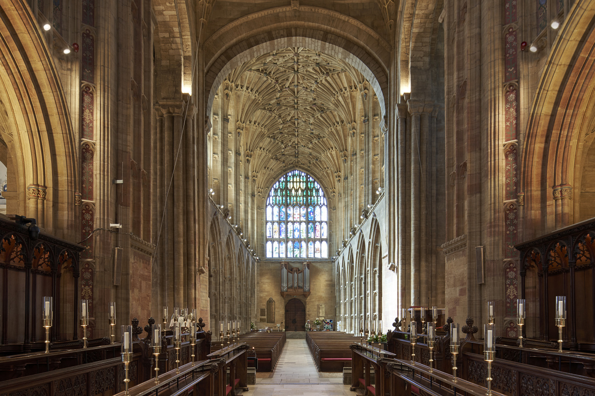 Sherborne Abbey interior featuring ERCO LED lighting, highlighting architecture and vaulted ceiling.