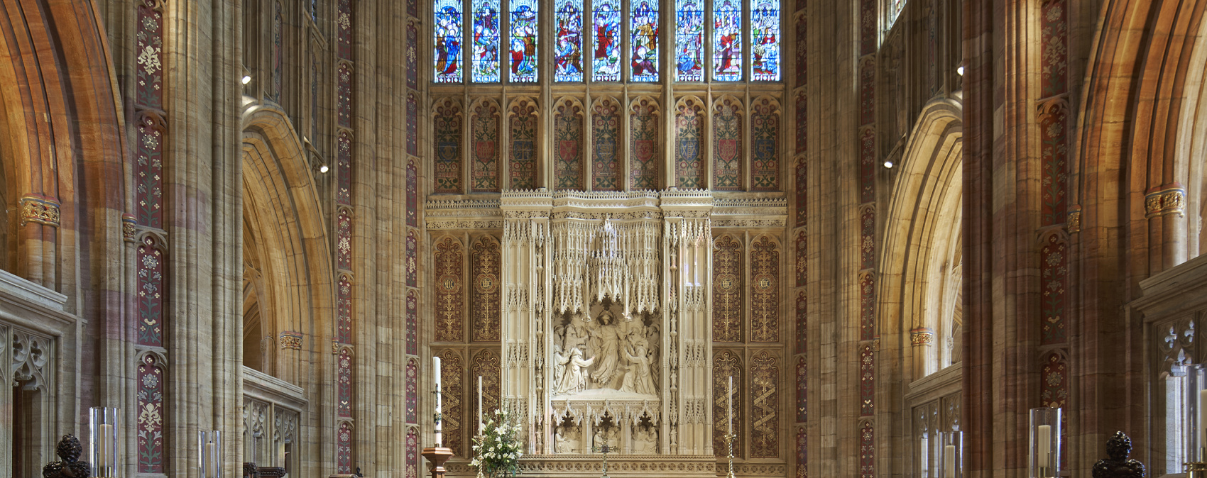 Interior of Sherborne Abbey featuring ERCO LED lighting, highlighting architectural details.