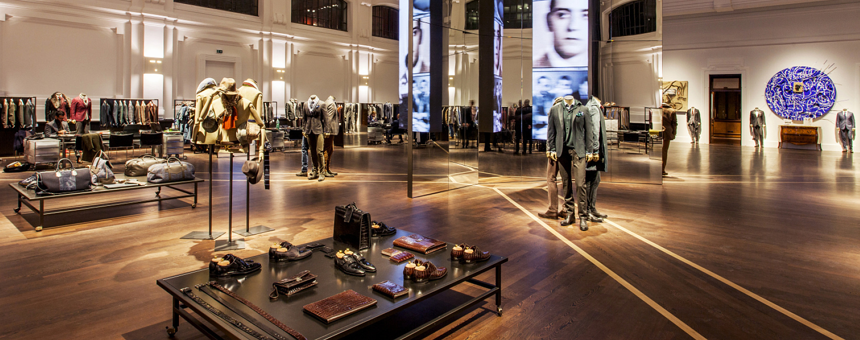 ERCO shop lighting showcasing menswear and accessories in a retail environment for enhanced shopping.