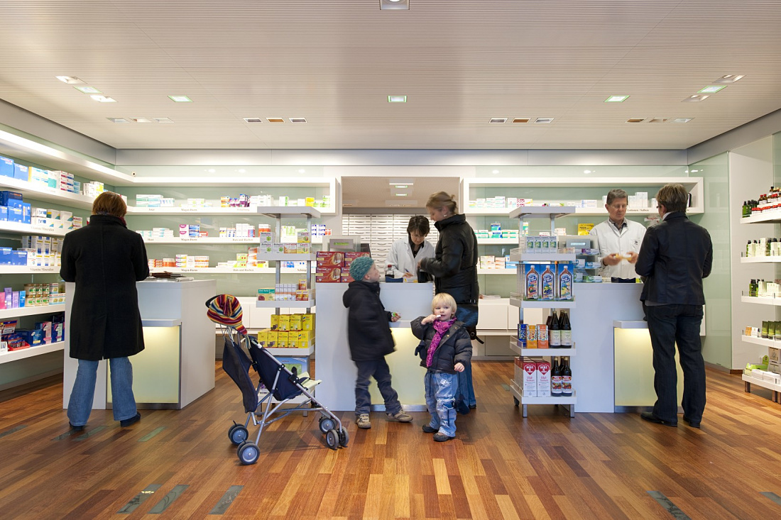 Sieben Schwaben Pharmacy featuring Quintessence recessed luminaires for efficient lighting.