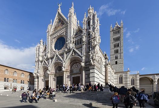 Siena Cathedral: Gothic architecture with ERCO LED lighting illuminating the marble floor.