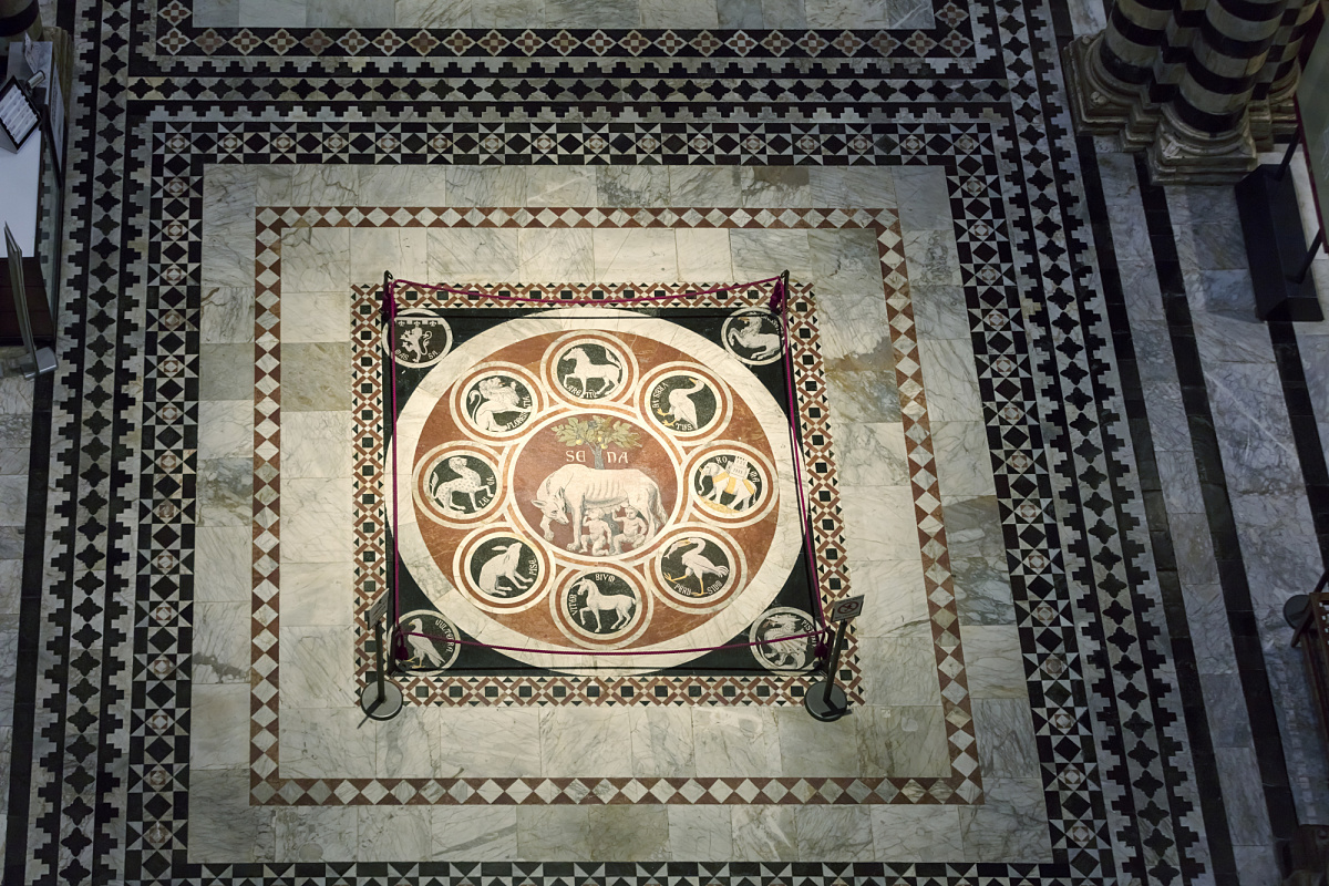 Siena Cathedral's marble floor detail, illuminated by ERCO spotlights from above.