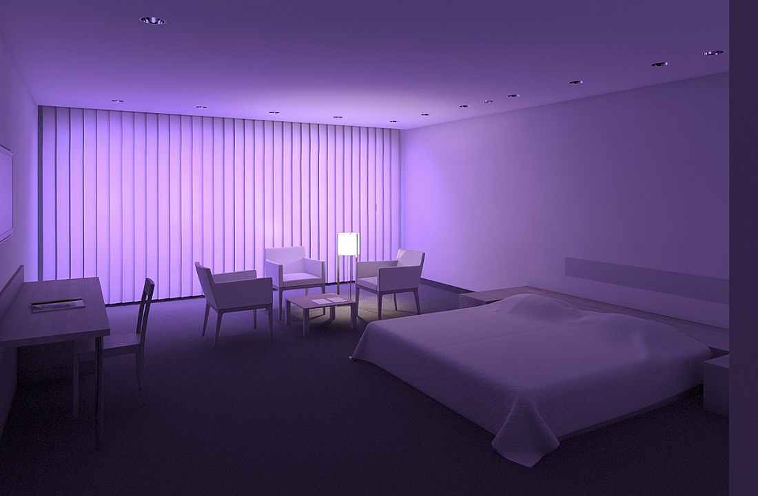 Hotel room with ERCO lighting: Accent lighting and decorative effects create an inviting atmosphere for guests.