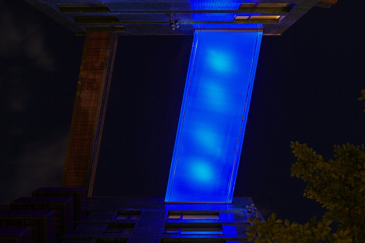 Sky Pool in London illuminated by ERCO Kona projectors with blue LEDs.