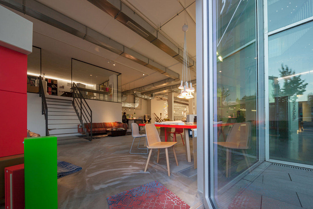 Sleeping Dogs store in Hamburg, featuring furniture and home accessories illuminated by ERCO LEDs.