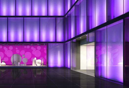 ERCO lighting design for a shop window featuring dynamic, colored light accents and variable focus.