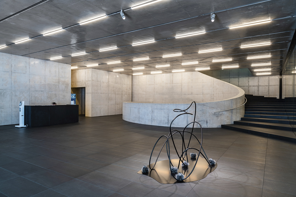 SongEun Art Foundation lobby featuring ERCO Eclipse spotlights for flexible museum lighting.