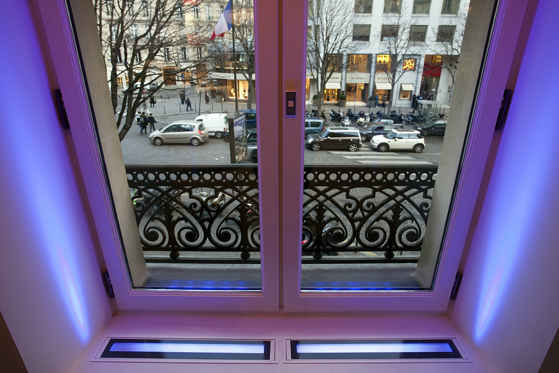 Focalflood LED facade of the Sony Style Flagship Store in Paris seen through a window.