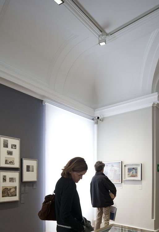 Visitors view art at the Sorolla Museum, Madrid, illuminated by Logotec LED spotlights.
