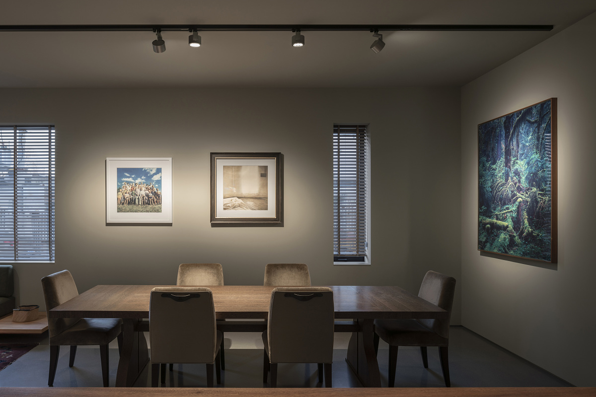ERCO Stella spotlights illuminate artworks in Space Z, Beijing. Accent lighting enhances a diverse art exhibition.