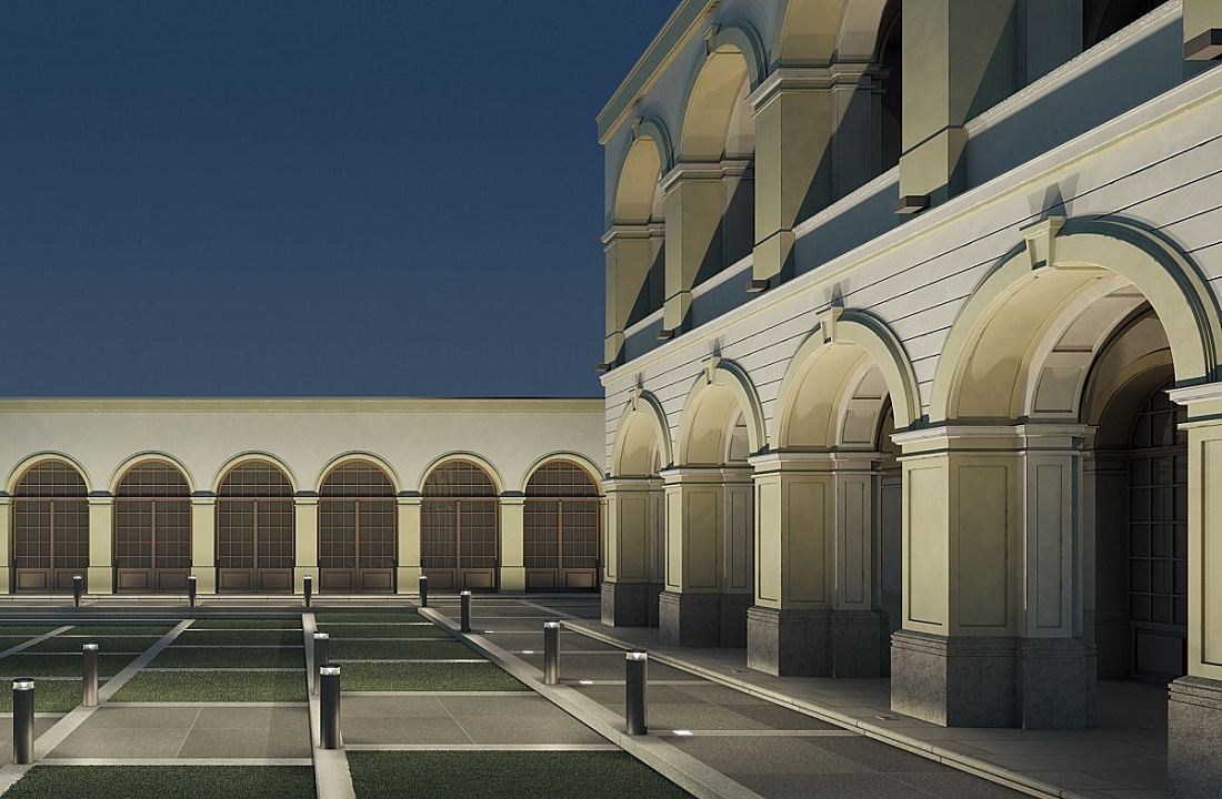 ERCO lighting design: Facade with rhythmic light patterns using bollard luminaires and uplights.