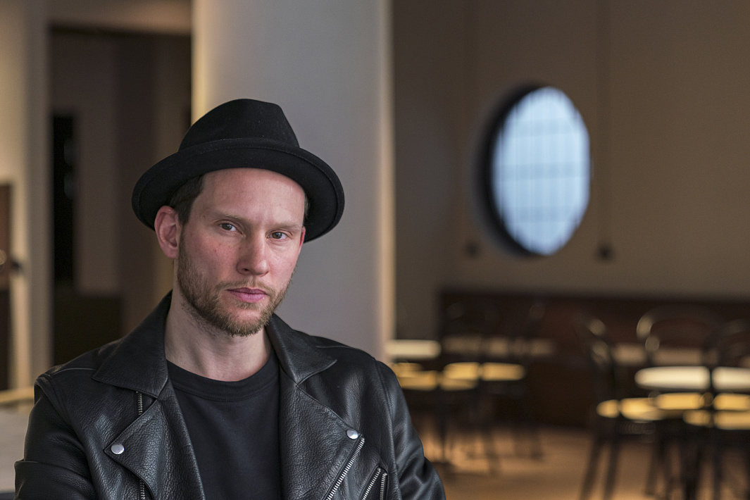 Portrait of lighting designer Joaquim de Abreu, staged with ERCO LED light.