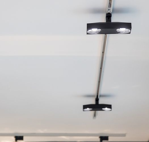 ERCO Pollux spotlights on a track, a flexible lighting solution for shop design in Frankfurt.