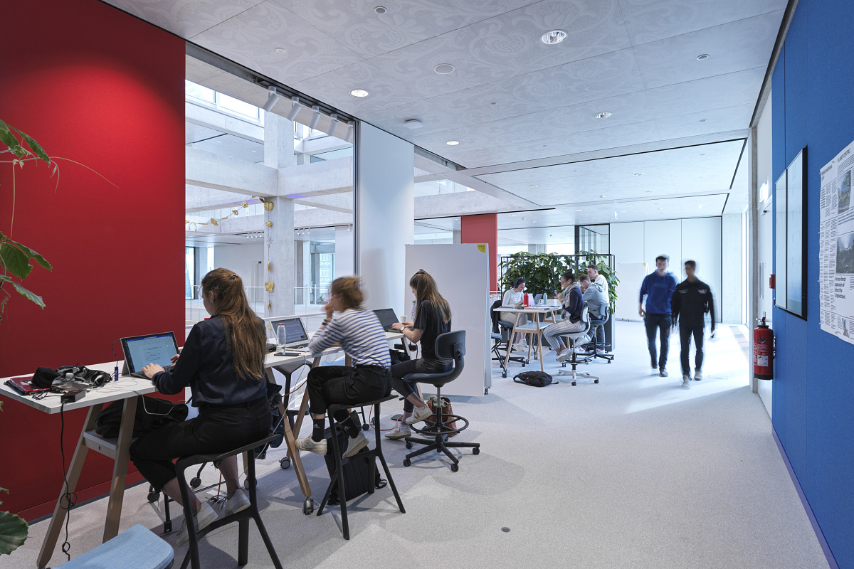 ERCO LED lighting in the University of St. Gallen Learning Center, providing visual comfort and flexible space use.