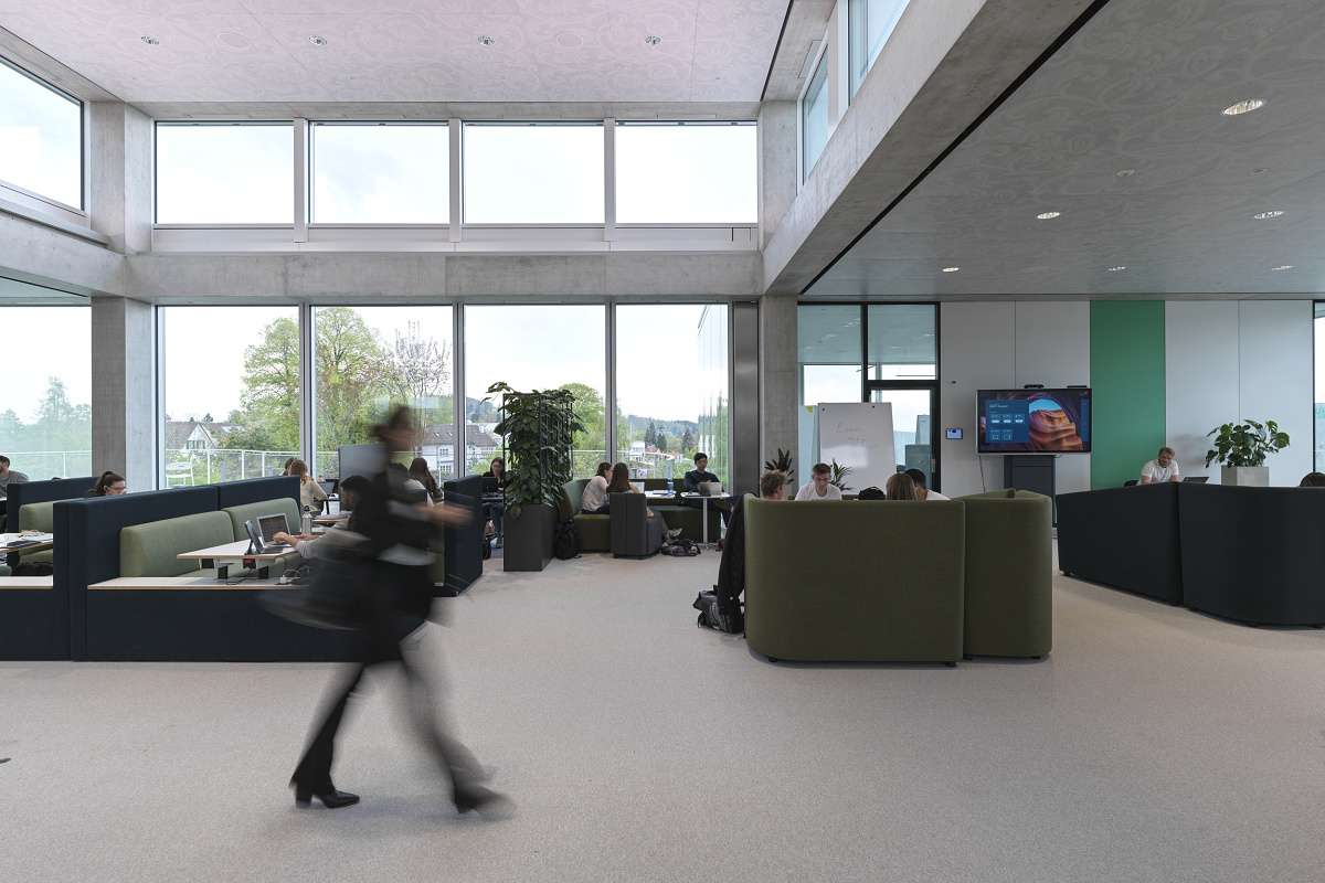 ERCO LED lighting in the University of St. Gallen's Learning Center, ensuring visual comfort and flexible space use.