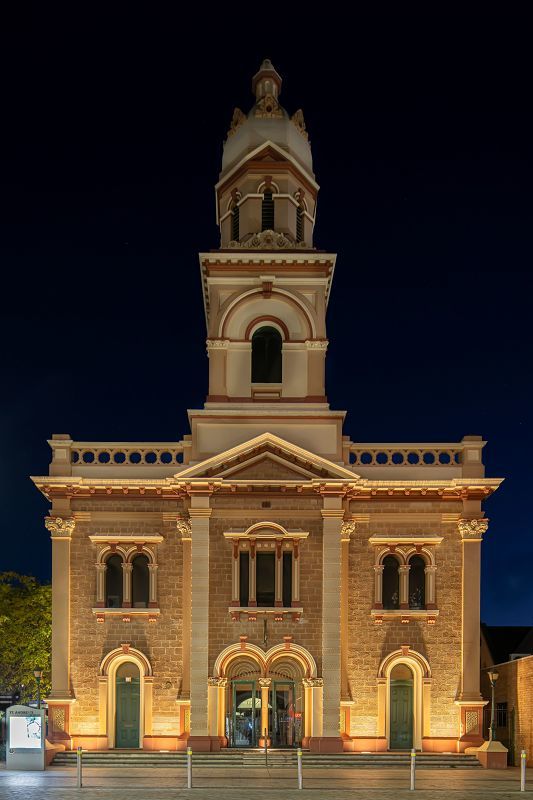 St Andrews Church facade illuminated at night with ERCO Site in-ground grazing light.