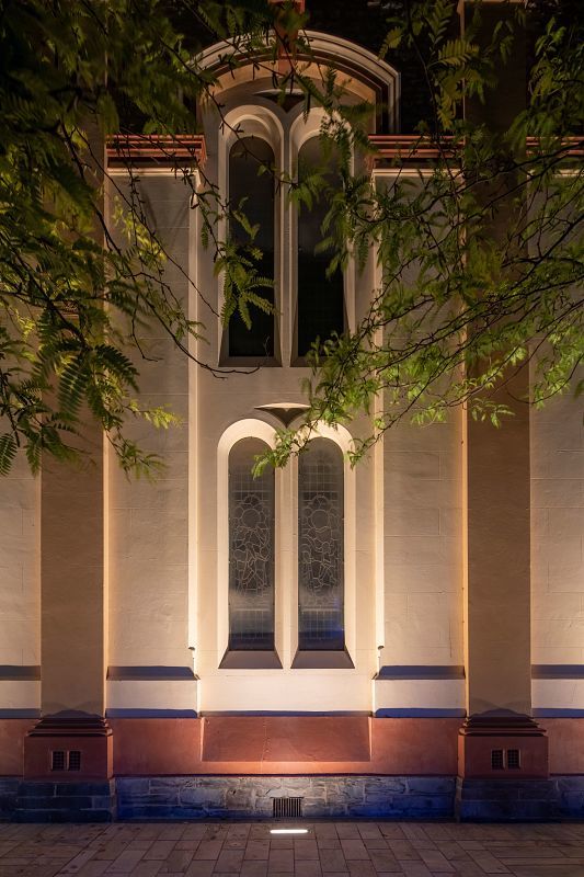 St Andrews Church facade illuminated by ERCO Site in-ground grazing light.