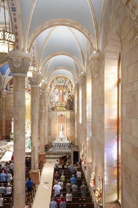 Interior of St. Joseph Church, Indiana, featuring ERCO LED lighting and restored architecture.