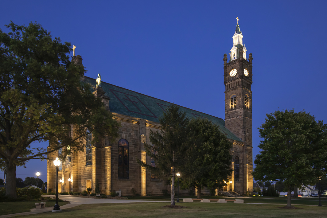 St. Joseph Church in Indiana illuminated by energy-efficient ERCO LED projectors at dusk.