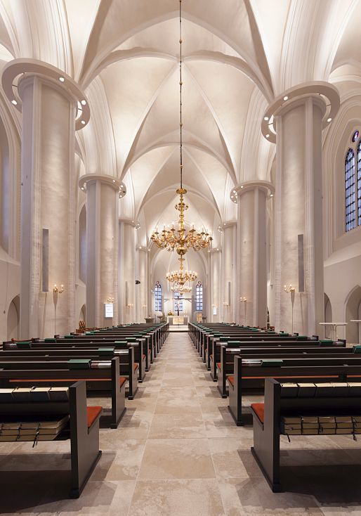 Interior of St Mary and Bartholomew Church in Harsefeld, illuminated by ERCO LEDs.