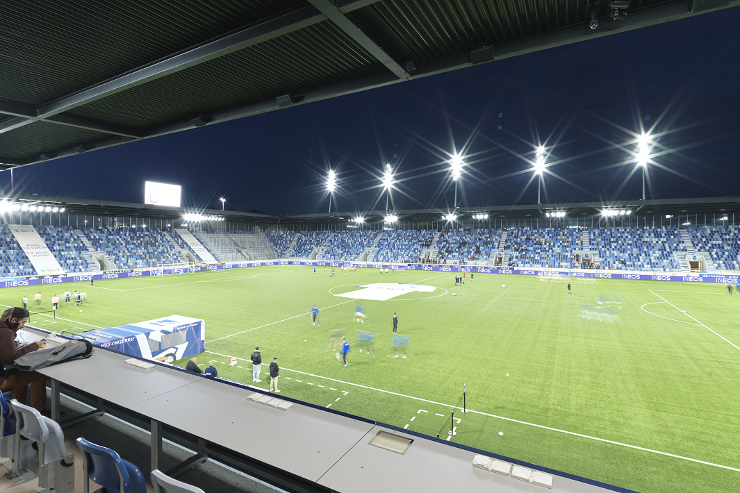 ERCO LED lighting at Stade de la Tuilière, Lausanne, ensures visual comfort and architectural accentuation.