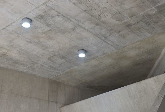 ERCO LED downlights providing glare-free lighting in Stade de la Tuilière, Lausanne.