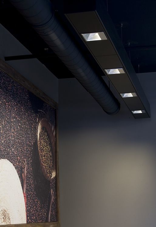 ERCO Quintessence LED wallwashers providing efficient lighting at the Starbucks in Altmarkt, Dresden.
