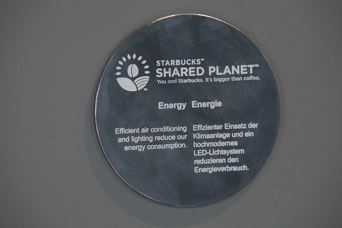 Starbucks Shared Planet initiative: LED lighting and efficient air conditioning for energy saving.