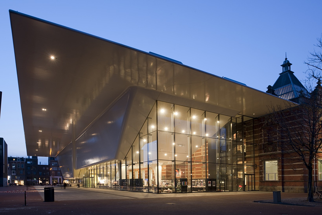 Stedelijk Museum Amsterdam, illuminated by ERCO LEDs, showcasing modern art.