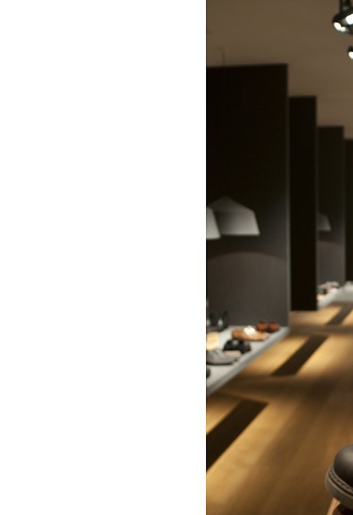 Stiefelkönig shoe shop featuring ERCO Light Board LED spotlights for bright, clever product presentation.