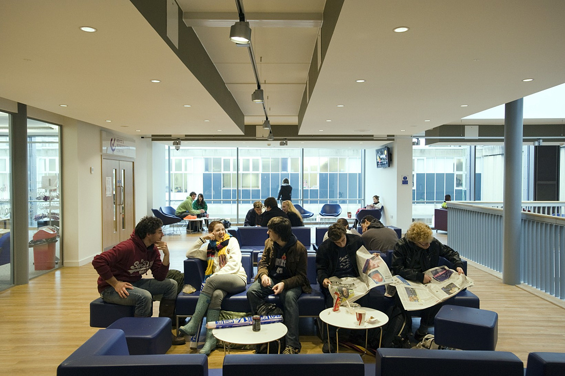 University of Bath student union social space illuminated by ERCO Quintessence LED recessed luminaires and Optec LED spotlights.
