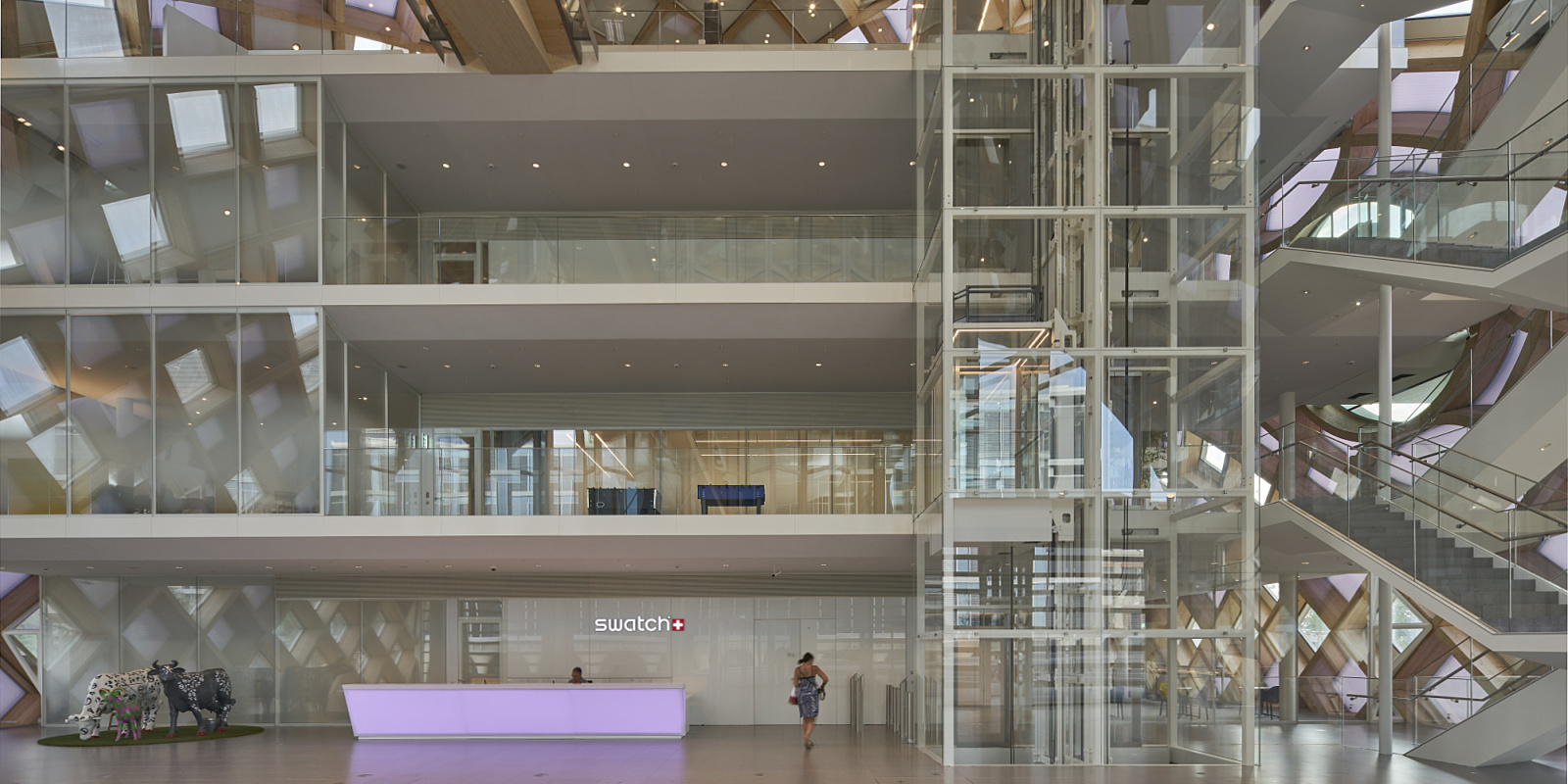 Interior of the Swatch headquarters in Biel, Switzerland, featuring ERCO lighting for offices and exhibits.