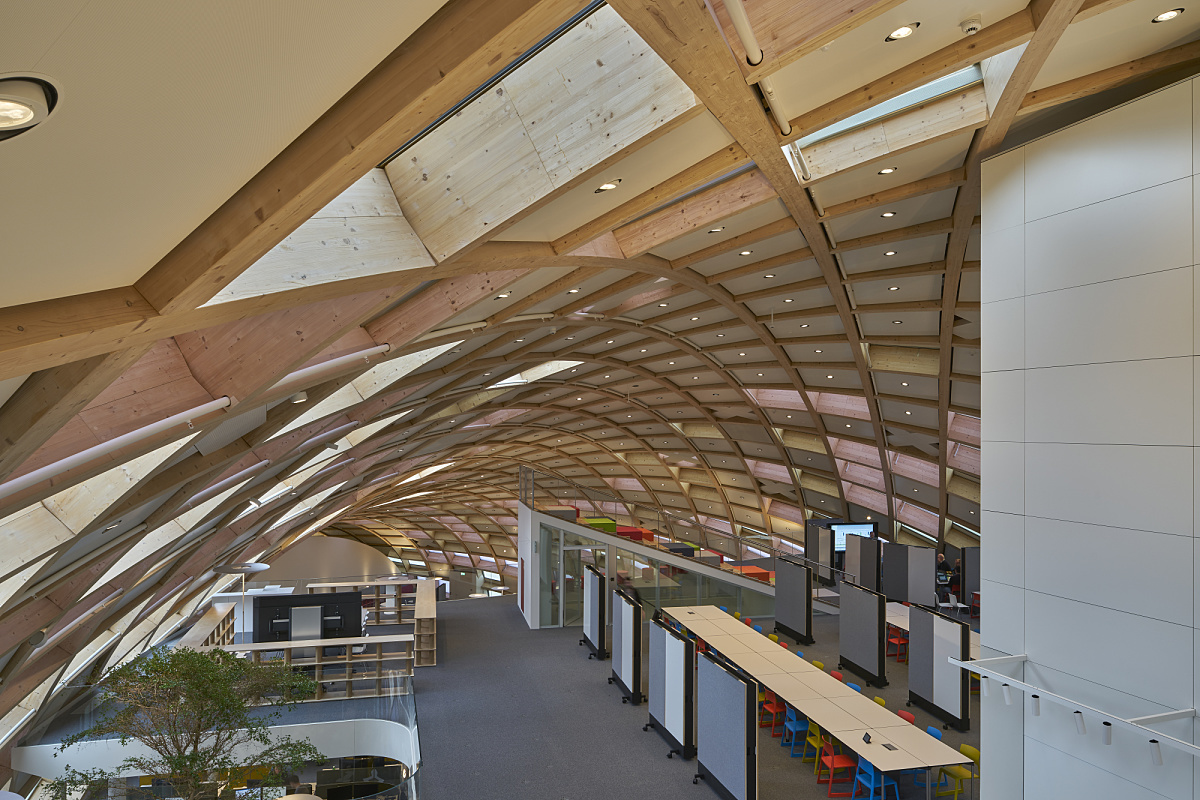 Interior view of Swatch HQ featuring Gimbal recessed floodlights for glare-free light.