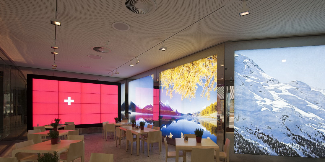 Swiss Corner Bar in Milan featuring ERCO Light Board spotlights for modern LED lighting.