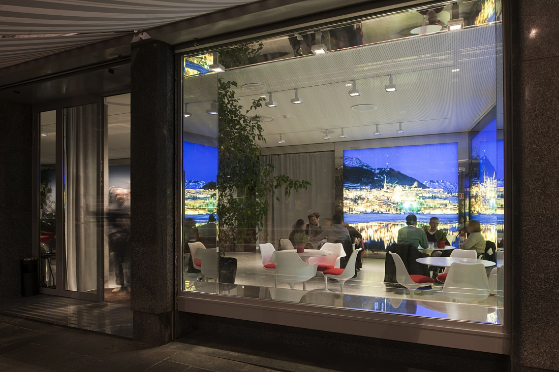 Swiss Corner Bar in Milan featuring ERCO Light Board spotlights, creating a modern and functional lighting design.